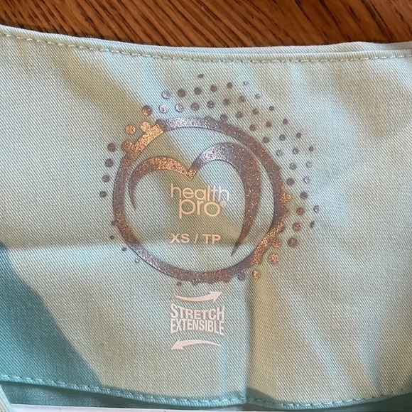 Teal Healthpro scrub top with pockets! Size XS - Picture 3 of 4